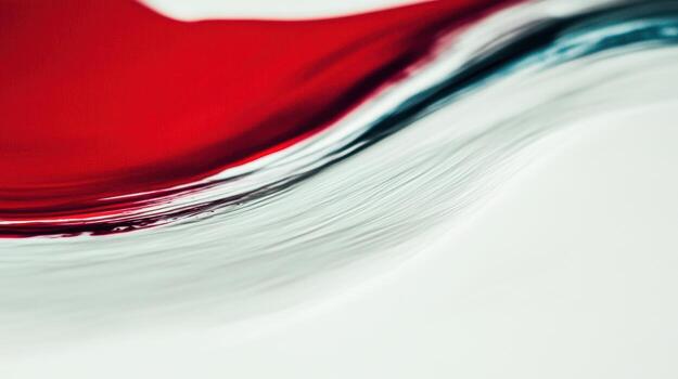 Vibrant red and blue paint blend on smooth surface photo