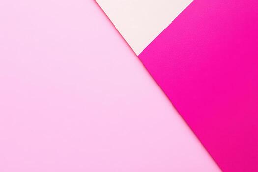 Colorful pink and white geometric pattern on a flat surface photo
