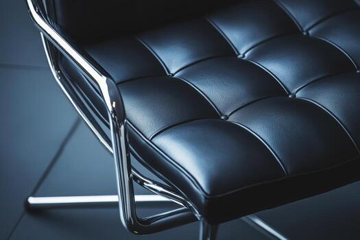 Elegant black chair with chrome details in modern setting photo