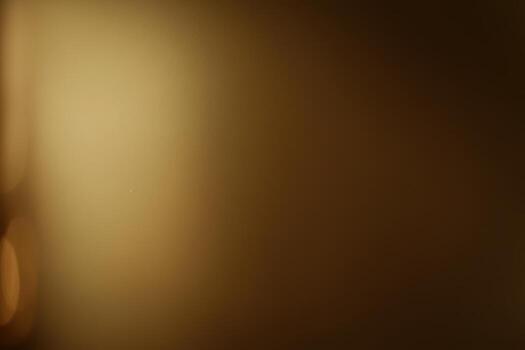 Soft warm light shining through a dark space in the evening photo