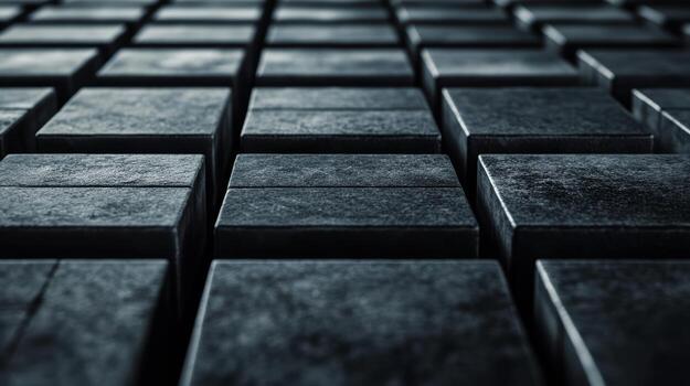 Abstract pattern of dark stone tiles arranged in grid photo