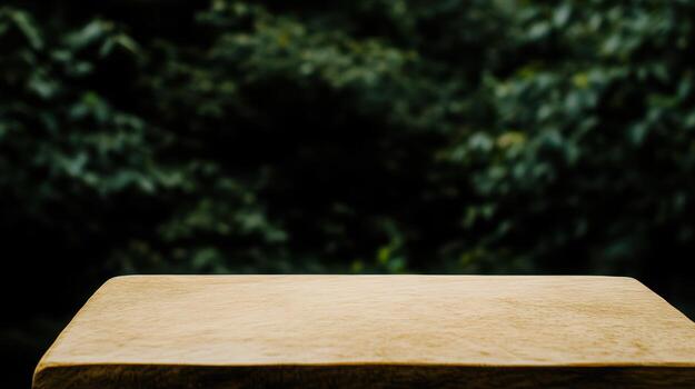 Natural wood surface with blurred green background in nature photo