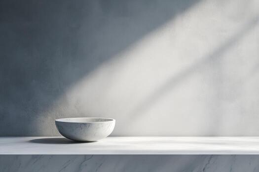 Modern marble bowl on a minimalistic countertop in bright light photo