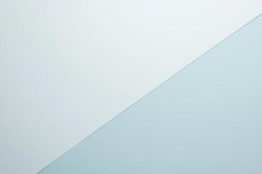 Soft blue and white diagonal backdrop for minimal designs photo