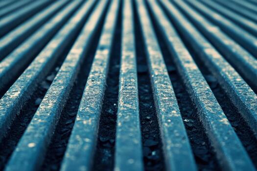 Metal grate patterns create lines in industrial setting photo