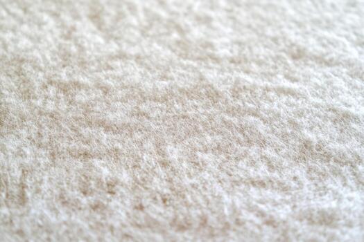 Close-up view of soft white textured fabric in natural light photo