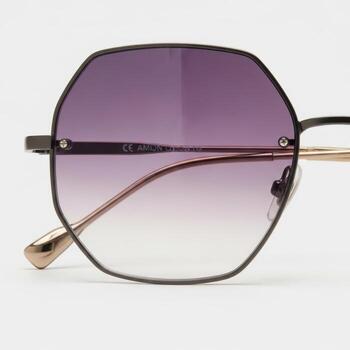 Stylish hexagonal framed sunglasses with gradient purple lenses isolated on white background photo