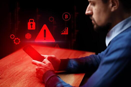 Man engages with smartphone while warning icons and symbols of cybersecurity appear in a dark environment photo