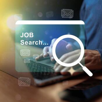 Engaging in a job search with a computer and virtual search interface highlighting email notifications photo