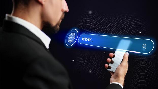 Man using smartphone to search on the internet with a digital interface at night photo