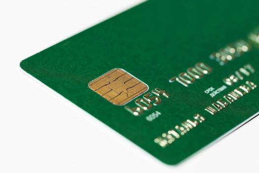 Credit card with chip close-up showing details and design in a minimal setting photo
