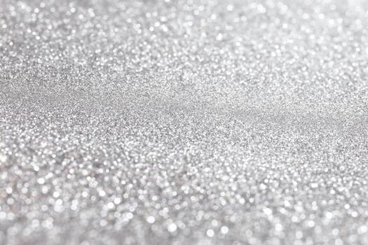 Shimmering silver surface glistens under soft light photo