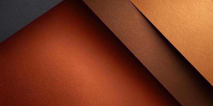 Layers of textured paper in warm tones and rich colors photo