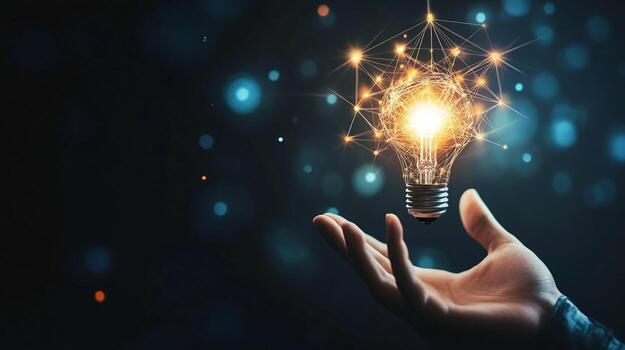 Illuminated Lightbulb with Interconnected Nodes Above Open Hand photo