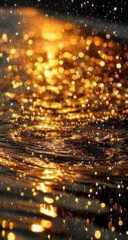 Golden light on water with sparkles photo