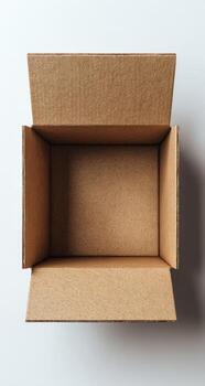 An empty cardboard box on a white surface photo