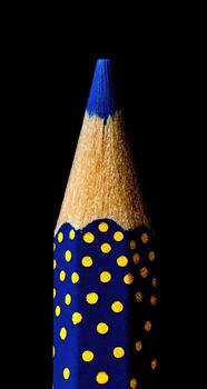 A pencil with polka dots on it photo
