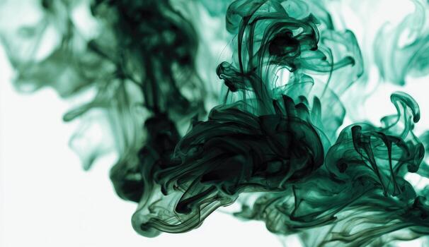 A close up of green ink in water photo