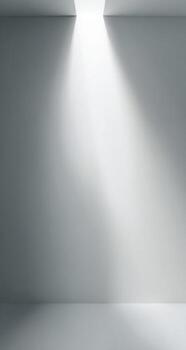 Empty room with light coming from the ceiling photo