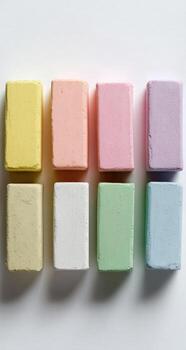A group of colored blocks on a white surface photo