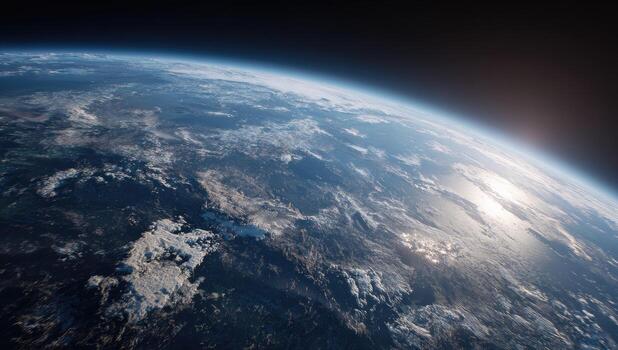 The earth from space with the sun shining photo