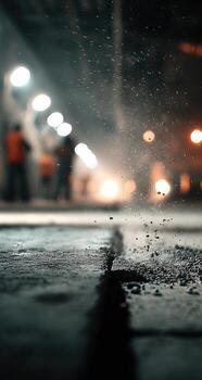 A man is standing in front of a concrete floor photo