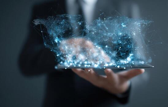 Businessman holding tablet with connected network concept photo