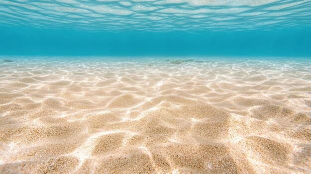 Underwater view of sandy beach with water surface photo