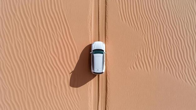 un aéreo ver de un coche conducción mediante el Desierto foto