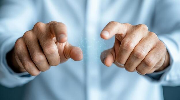 Hands of businessman touching a button photo