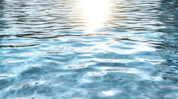 Water surface with sun shining through it photo