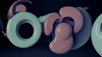 abstrakt vätska former flätas ihop och utveckla i en sömlös rörelse sekvens, visa upp dynamisk former och vibrerande färger mot en mörk bakgrund video