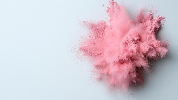 Pink powder exploding on white background photo