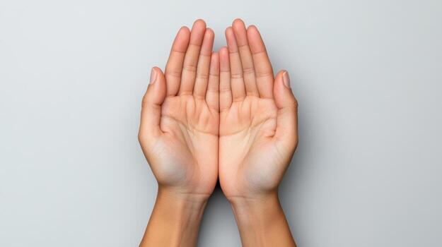 Two hands with open palms on a white background photo