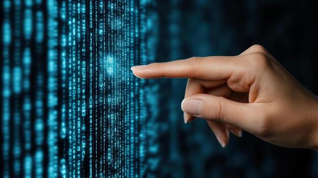 A finger touching a binary code on a screen photo
