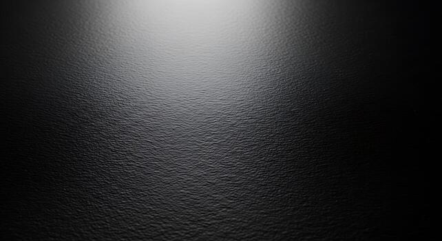 Close-up textured leather surface with subtle light gradient for background use photo