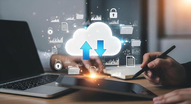 Businessperson manages data transfer using cloud technology on a digital tablet and laptop in a modern office, symbolizing efficient workflow and secure data management photo