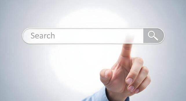 Close-up of a hand using index finger to tap on a search bar with a magnifying glass icon, representing a digital search, exploration, and discovery concept The image conveys a sense of inquiry, inves photo