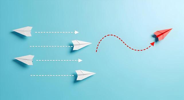 Red paper airplane taking a different path than other white airplanes on a blue background, symbolizing unique ideas and innovative thinking This represents a concept of standing out from the crowd, t photo