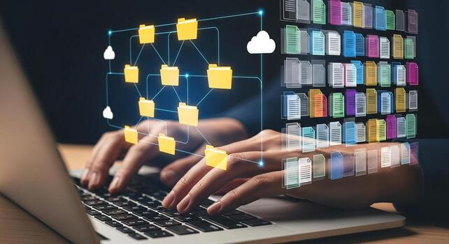 Person working on laptop computer managing digital files and folders in a cloud network concept of remote work and efficient data organization photo