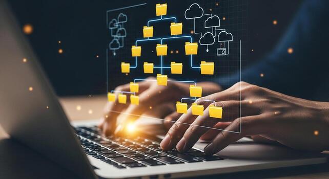 Person managing and organizing digital files and data on laptop cloud computing network online storage digital workspace efficient workflow data management cybersecurity technology innovation photo