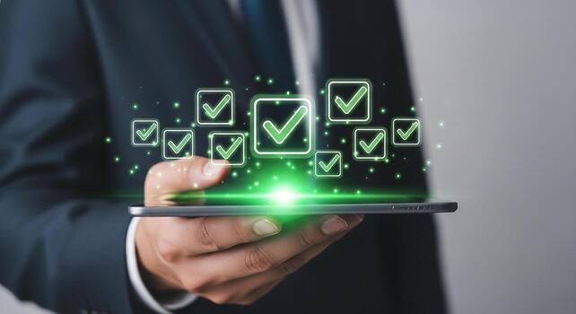 Businessperson using digital tablet to review and approve tasks projects or checklist items concept of successful workflow management and efficiency in modern business photo