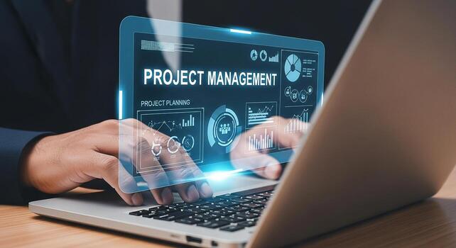 Businessman using laptop computer to manage project planning, analyzing data charts and graphs in a modern office, showcasing efficiency and success photo