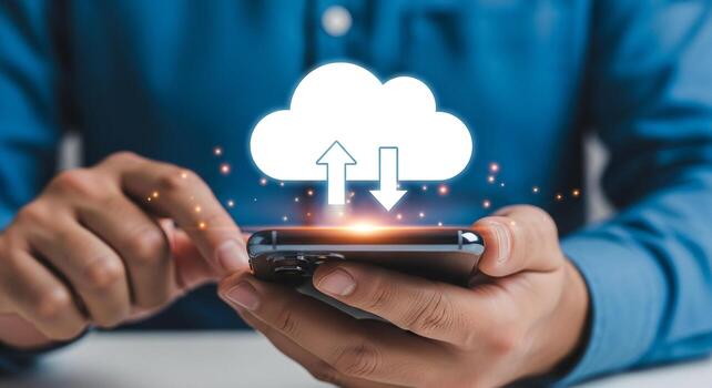 Person using smartphone to access cloud computing data transfer and storage digital technology concept Modern mobile phone displaying cloud upload and download icons symbolizing seamless data synchron photo