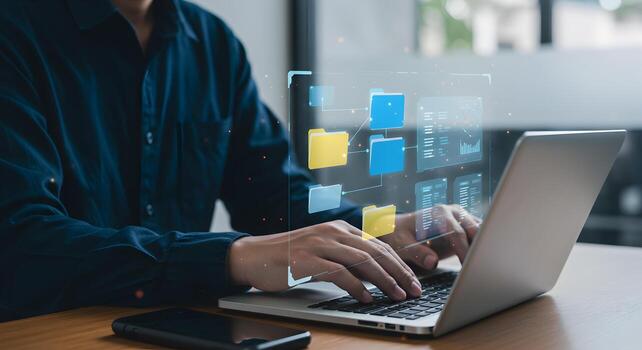 persona trabajando diligentemente en ordenador portátil computadora gerente digital archivos y datos en un moderno oficina exhibiendo eficiencia y tecnológico avance foto