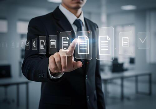Businessman using digital interface to manage documents in a modern office symbolizing efficient workflow and digital transformation photo