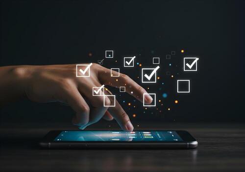 Hand using index finger to check digital checkboxes on a smartphone screen accomplishing tasks and goals with technology dark background concept of efficiency and productivity photo