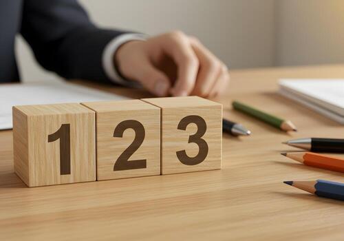 Wooden blocks with numbers 1 2 3 on a desk signifying a sequence process or steps Closeup view of the numbers on a light brown wooden table with pencils and pens suggesting planning strategy or a busi photo