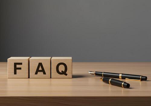 FAQ concept with wooden blocks and elegant pens on a desk signifying answers and solutions ideal for help center or customer service websites photo