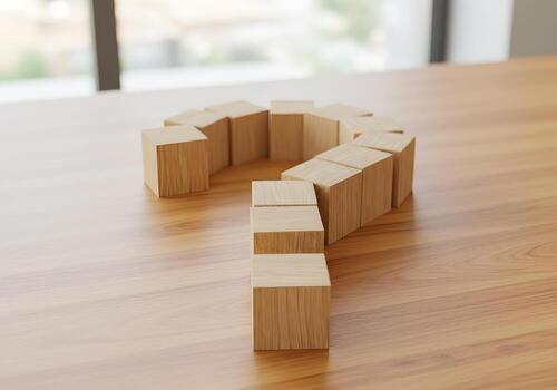 Wooden blocks forming a question mark on a table uncertainty concept problemsolving decisionmaking The blocks are arranged to create a question mark shape representing doubt inquiry and the search for photo